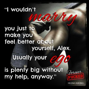 Profile portrait of businessman working on laptop in black suit at studio